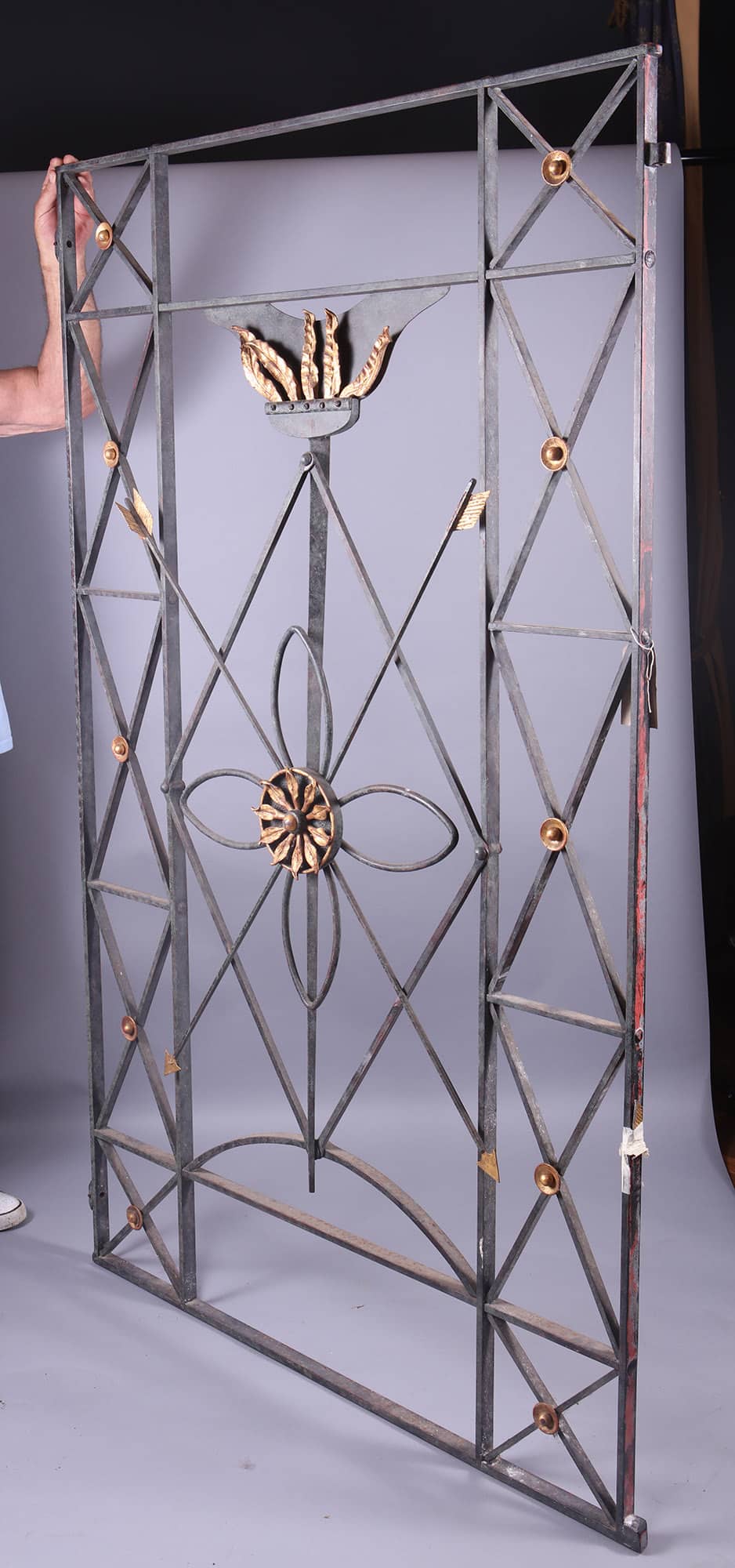 Wrought iron and gilt metal window grille with decorative floral and torch motifs from Collection CK10 by Mark Brazier Jones