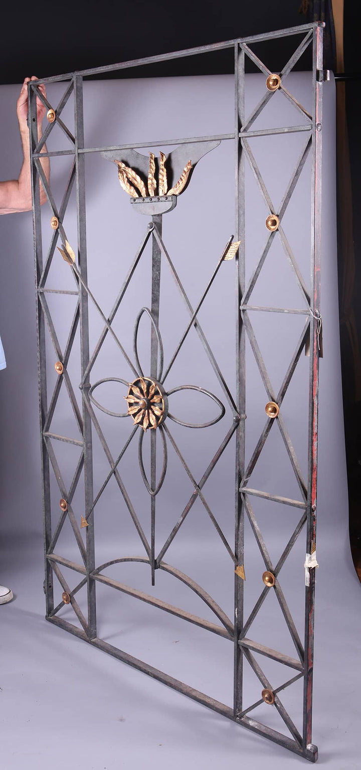 Wrought iron and gilt metal window grille with decorative floral and torch motifs from Collection CK10 by Mark Brazier Jones