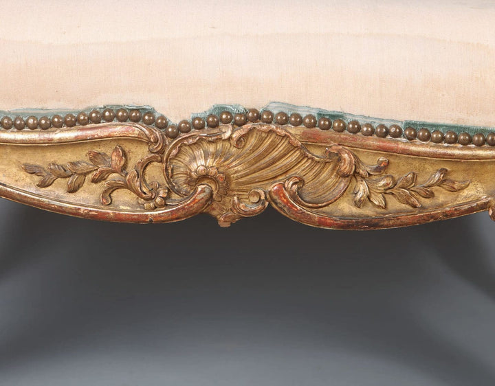 Close-up of gilt beech frame with shell and foliate carving on a Napoleon III Rococo window seat by Collection CK20