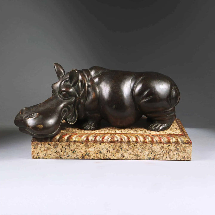 Bronze Hippo Antique Sculpture on marble base with carved giltwood edges, European, circa 1900, 21x36x23 cm.