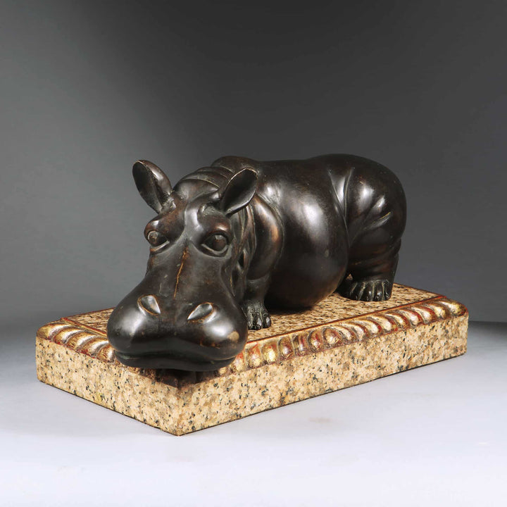 Bronze Hippo Antique Sculpture on a marble base with carved giltwood gadrooned edges, circa 1900, Europe.