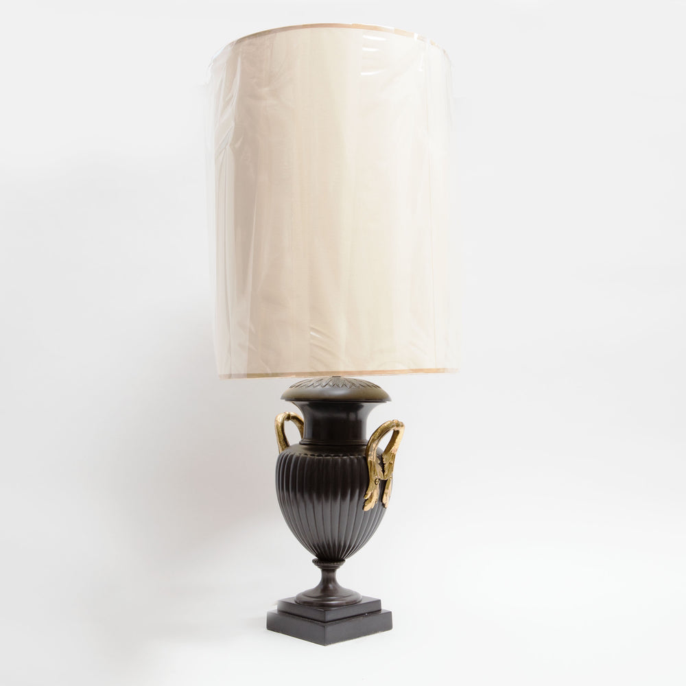 Pair of Neo-Classical Bronze Urn Lamps with lacquered brass handles and reeded body, England circa 1970, tall beige shade