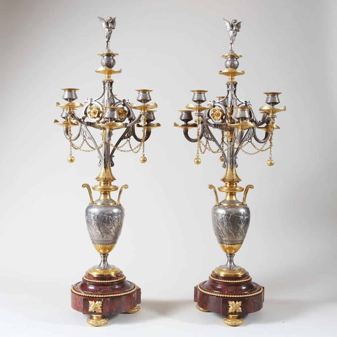 Pair of gilt and silvered bronze candelabra on Rouge Griotte marble bases by Nwtiques.