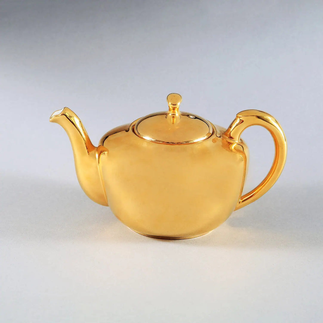 Royal Worcester 1970s gold lustre porcelain teapot vintage design sold by Nwtiques