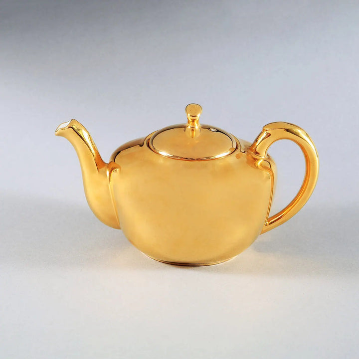 Royal Worcester 1970s gold lustre porcelain teapot vintage design sold by Nwtiques