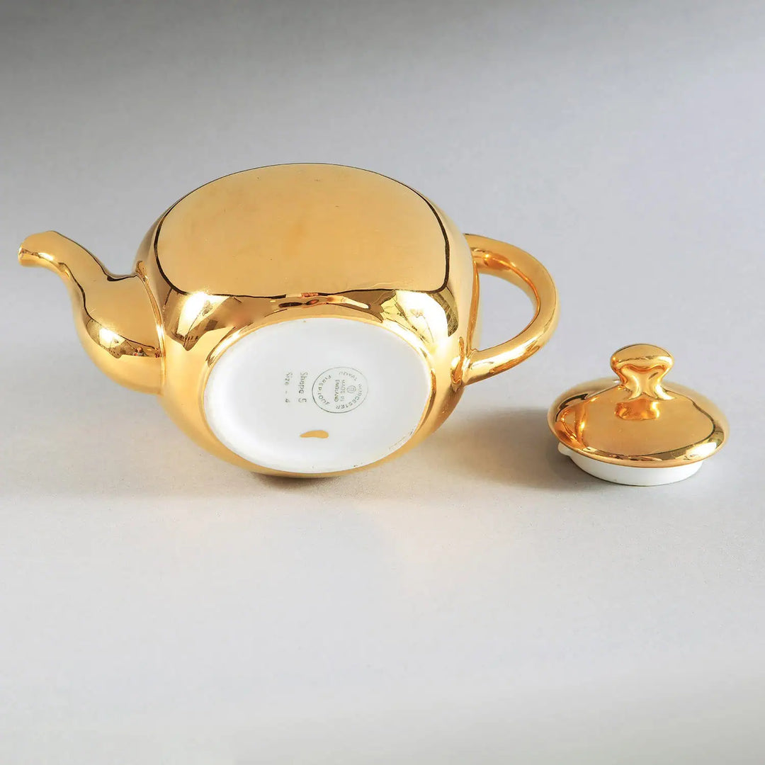 Vintage Royal Worcester 1970s gold lustre porcelain teapot with lid, offered by Nwtiques, base showing marks.