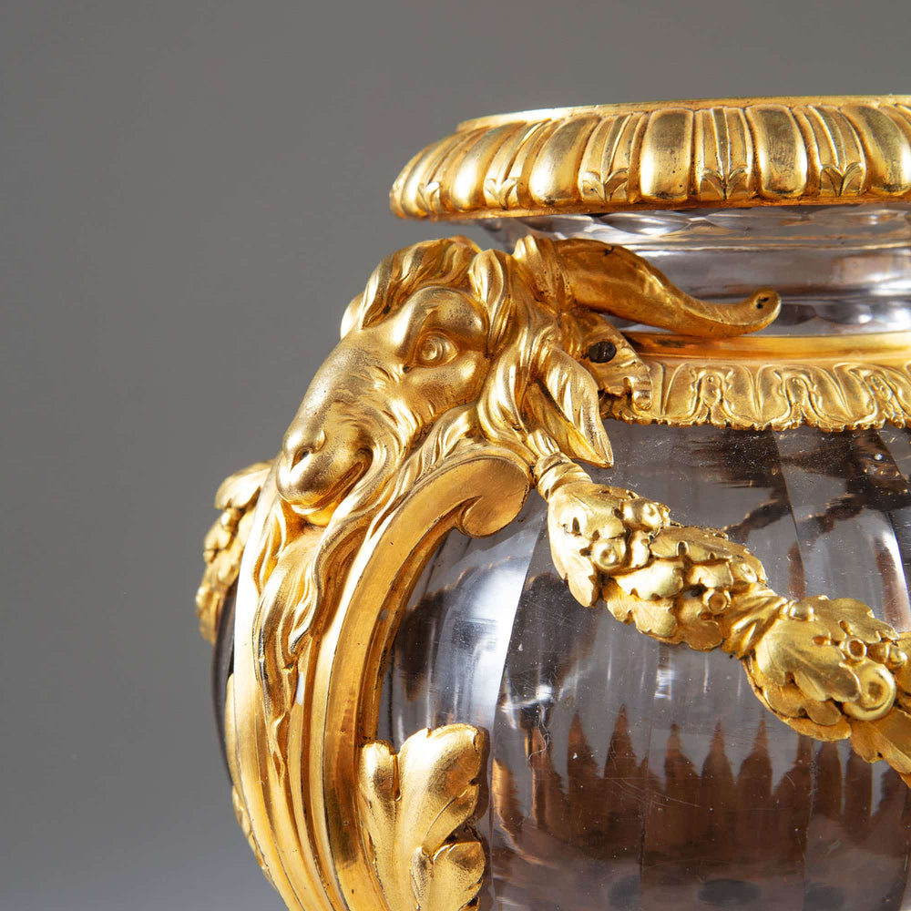 Close-up of Neo-Classical faceted glass vase with intricate ormolu goat head mount by Collection CK20