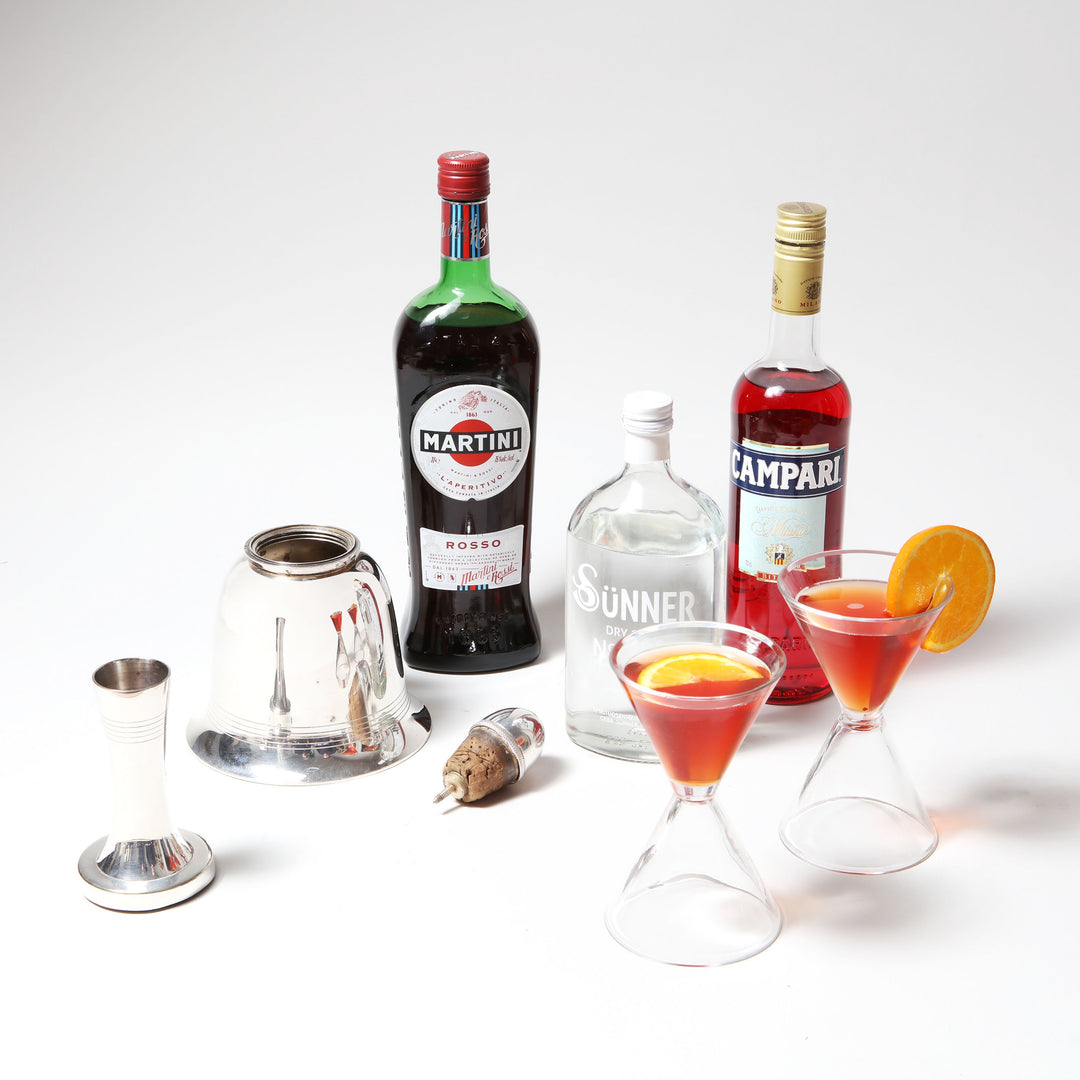 Asprey Bell Shaped Cocktail Shaker and barware set with spirits and cocktails by Collection TH10