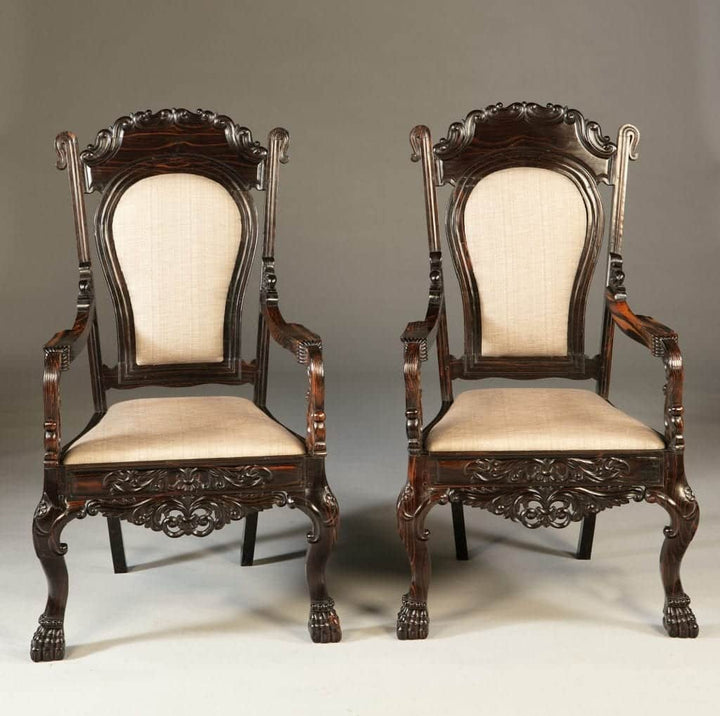 Pair of 19th century Sinhalese calamander wood armchairs with carved ornament and claw feet by Nwtiques