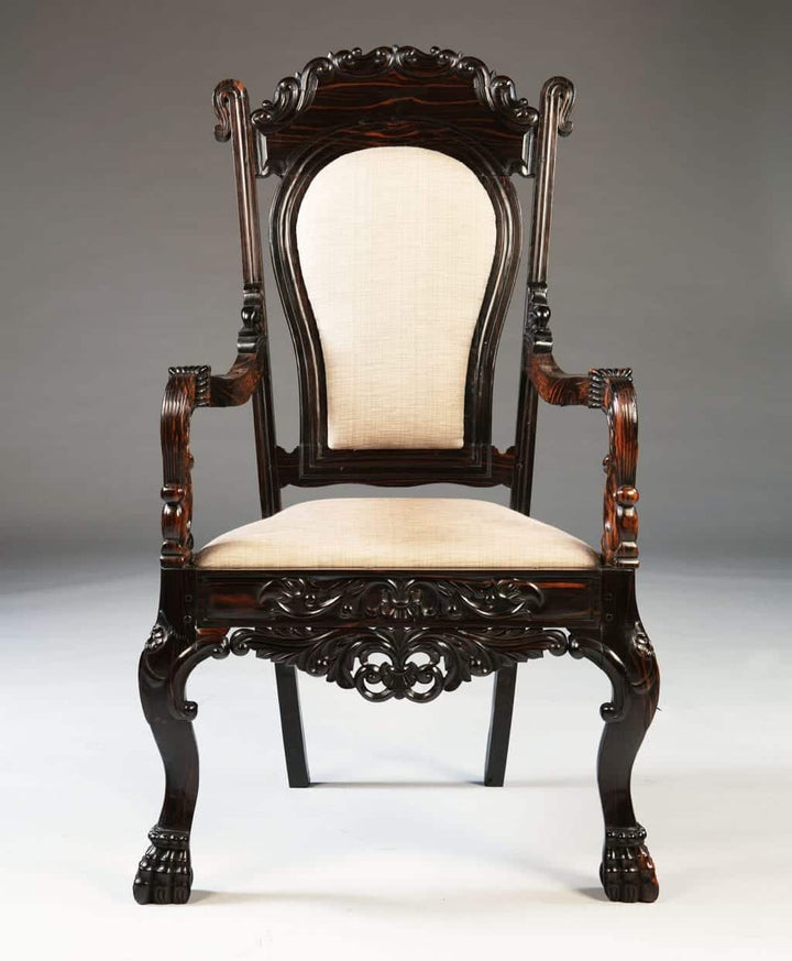 Antique Sinhalese Calamander wood armchair with carved claw feet and upholstered seat by Nwtiques