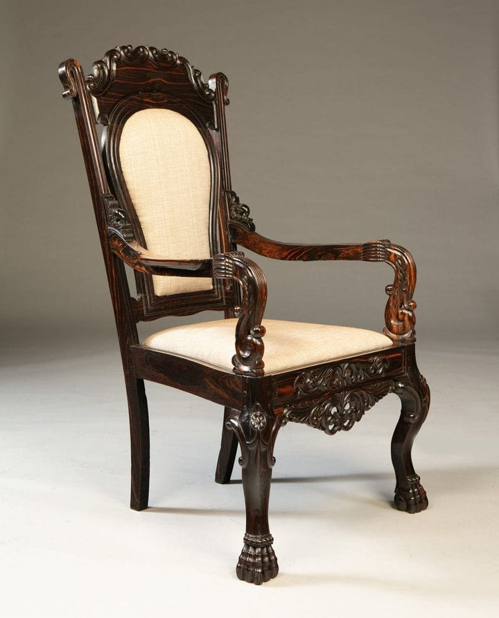 Single 19th century Sinhalese calamander wood armchair with carved details by Nwtiques