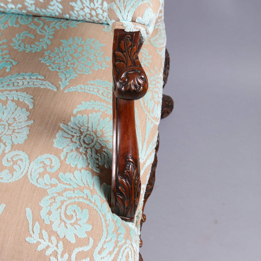 Close-up of carved wood armrest and patterned upholstery on Gainsborough Chair by Collection CK20