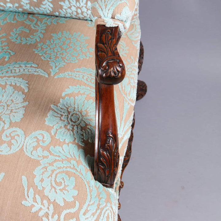 Close-up of carved wood armrest and patterned upholstery on Gainsborough Chair by Collection CK20