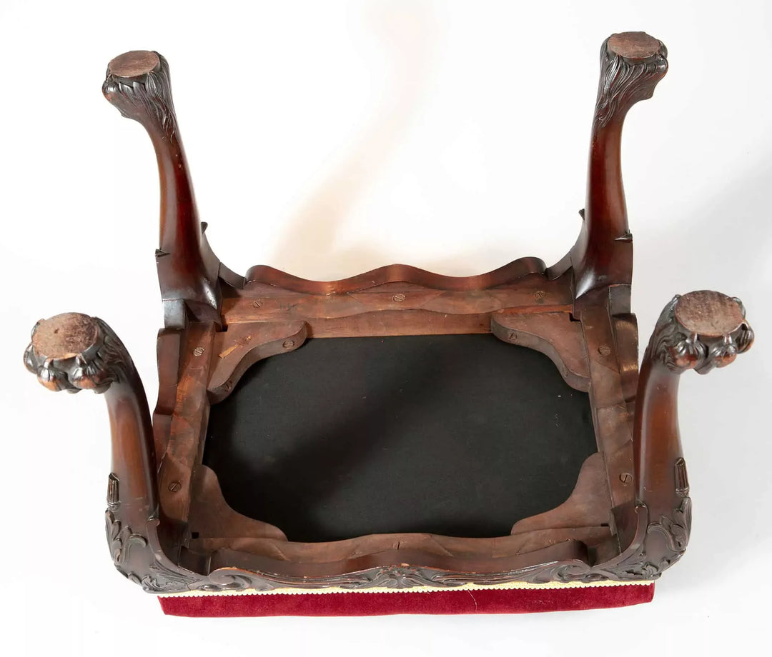 Underside view of 19th century carved mahogany George II stool with claw feet by Collection CK20