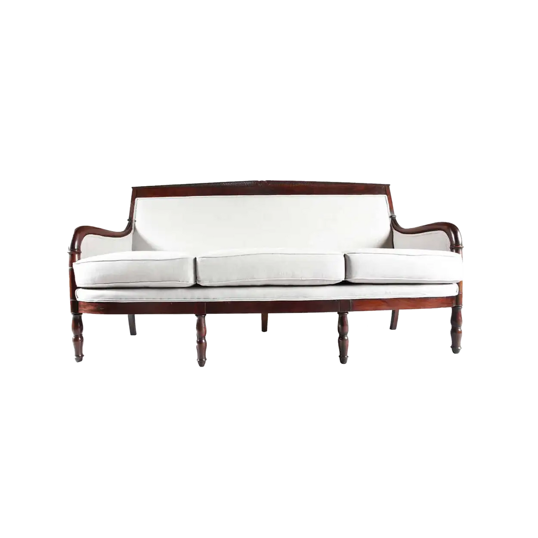 Early 19th century French Empire mahogany sofa with white upholstery by Collection TH20, elegant period design.