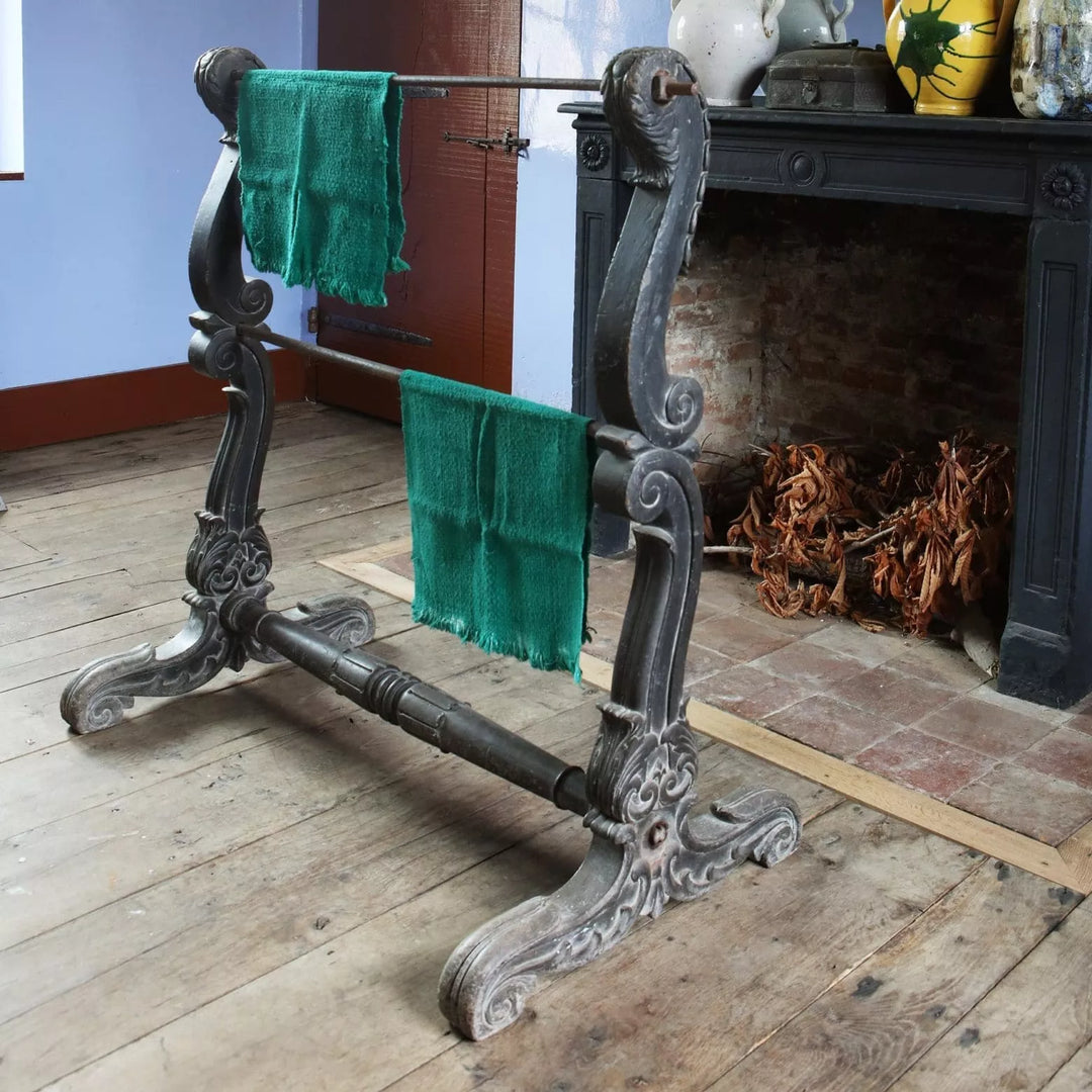 Substantial Indian ebonised double saddle rack stand with carved scroll feet and steel rails by Collection EE10