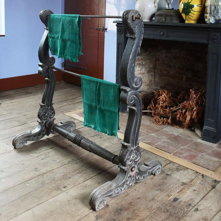 Substantial Indian ebonised double saddle rack stand with carved scroll feet and steel rails by Collection EE10
