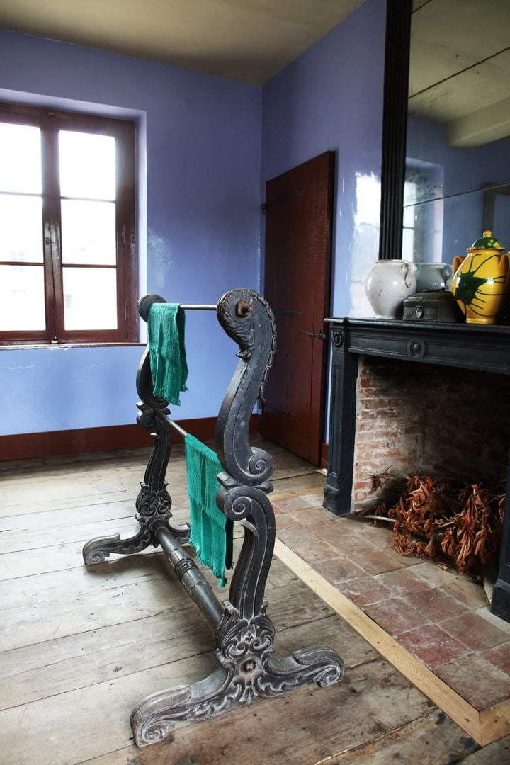 Substantial Indian ebonised double saddle rack stand with carved scroll feet and steel rails by Collection EE10