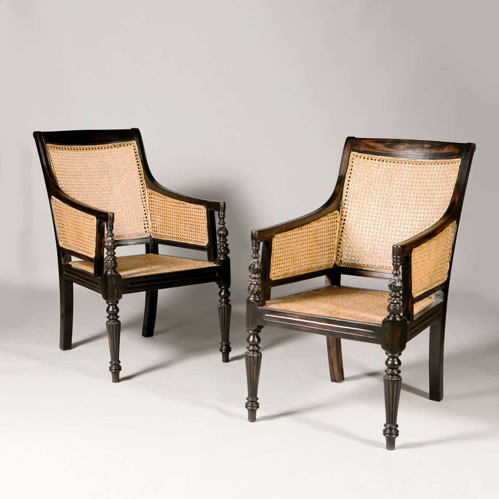 Pair of Regency style ebony caned library chairs with turned legs, from Collection EE30, elegant British craftsmanship.