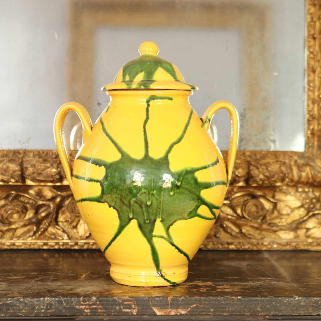 Canary yellow vase with green splash glaze and lid featuring loop handles by Collection EE20