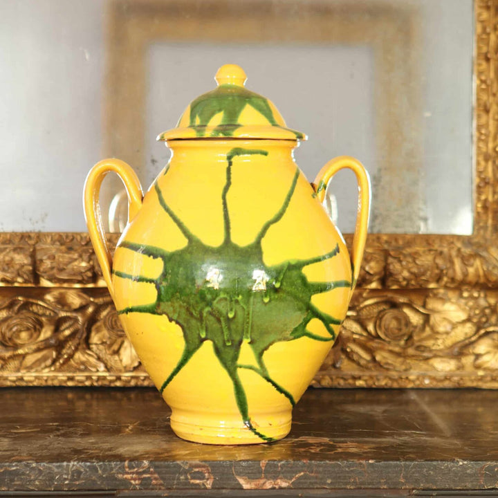 Canary yellow vase with green splash glaze and lid featuring loop handles by Collection EE20