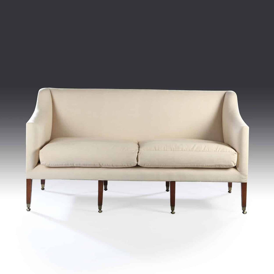 George III flat back mahogany sofa with off-white linen upholstery and brass-tipped legs by The Sold Archive