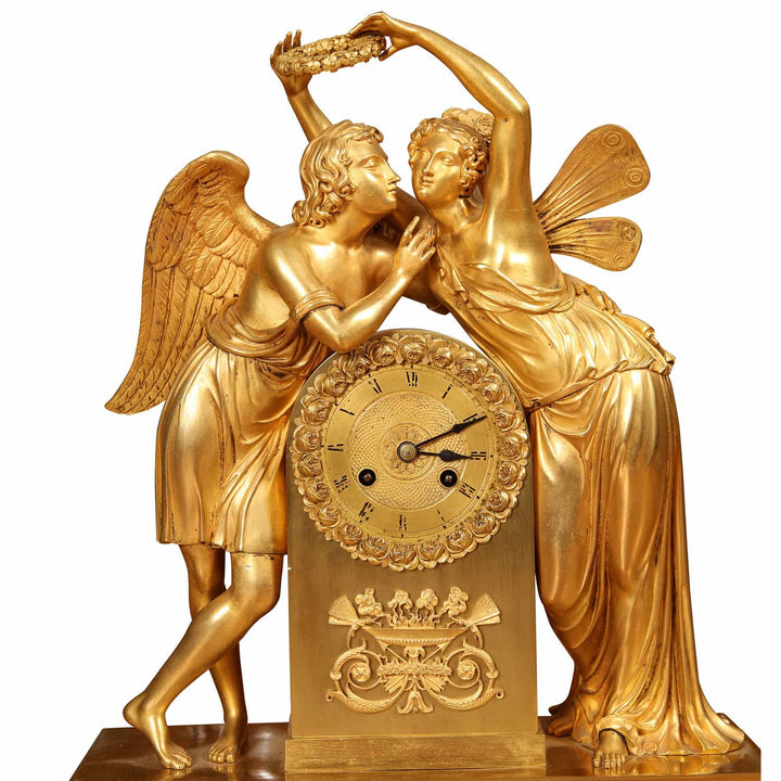 Early 19th century gilt bronze mantel clock with Cupid and Psyche figures by Nwtiques