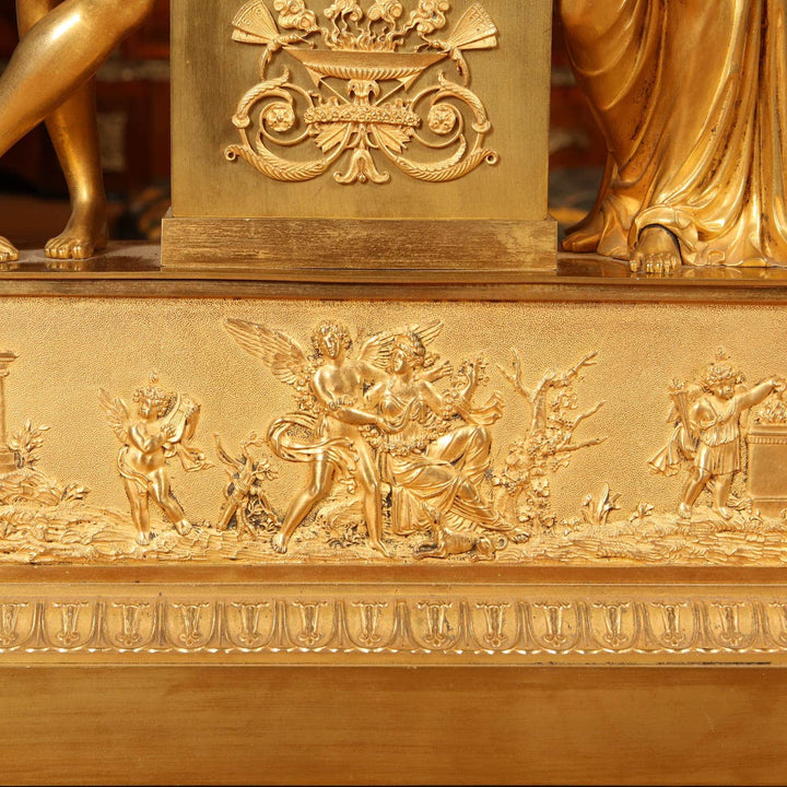Detailed gilt bronze allegorical scene on early 19th century mantel clock by Nwtiques