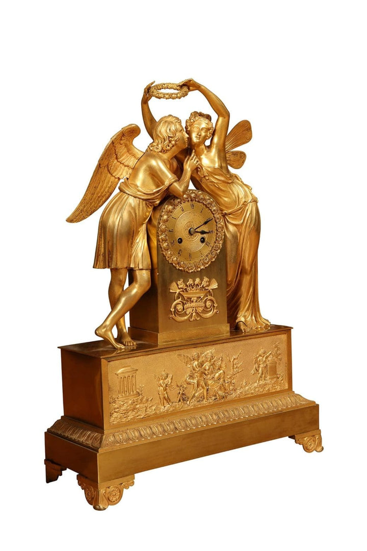 Early 19th century gilt bronze mantel clock with Cupid and Psyche by Nwtiques, French circa 1820