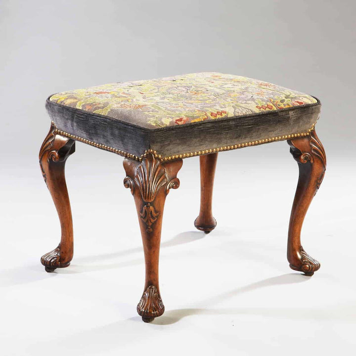 Early 18th century George II walnut stool with petit point upholstery by Collection CK20, showcasing carved cabriole legs.