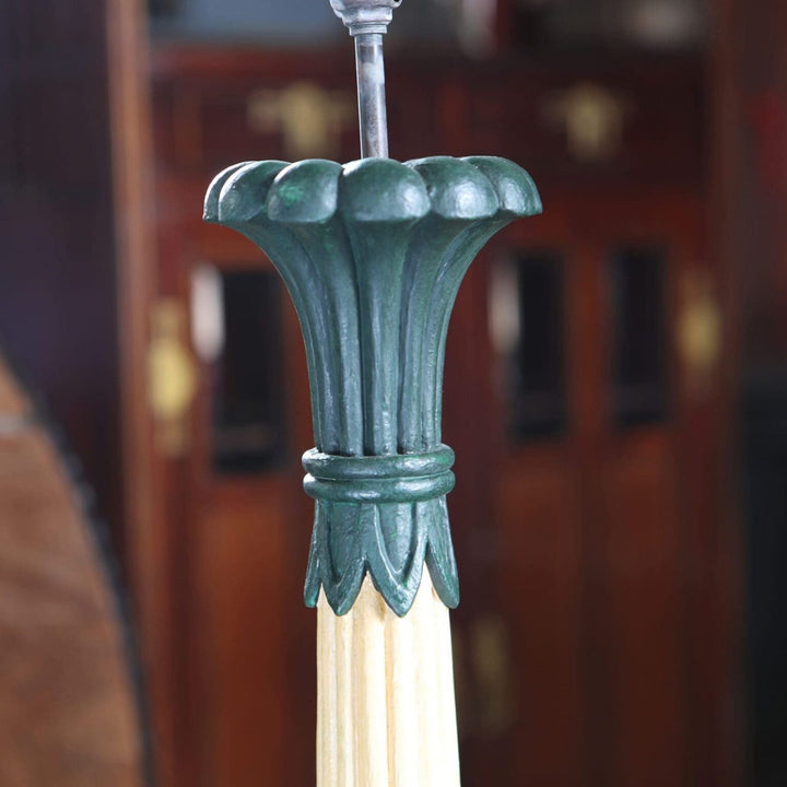 Pair of Foliate Column Lamps with cream lacquered columns and dark green bases, raised on polished brass ball feet.