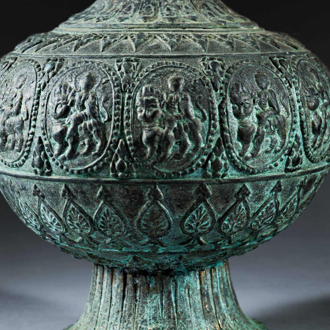 Indian Bronze Vase as a Table Lamp with detailed high relief deity scenes on bulbous body and flared foot circa 1875.