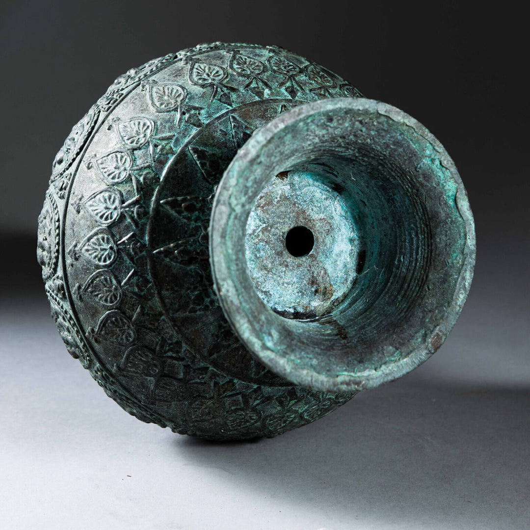 Indian Bronze Vase as a Table Lamp showing top view of 19th century bronze vase with intricate deity relief decorations.