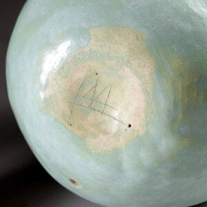 Pair of Celadon Vases as Lamps showing close-up of celadon glaze and signature by Andrew Allfree lamps.