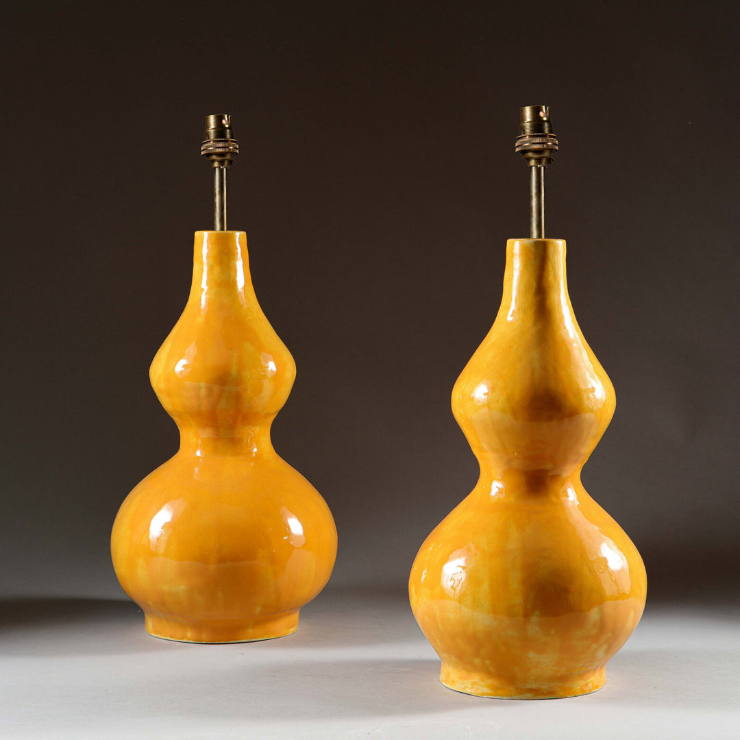 Pair of Yellow Double Gourd Vases as Lamps with glossy yellow glaze and double gourd shape by Andrew Allfree.