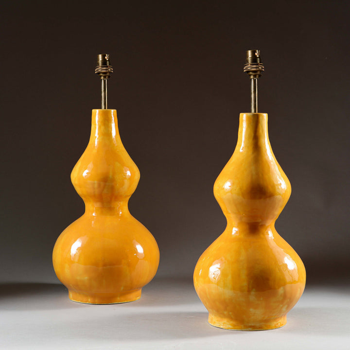 Pair of Yellow Double Gourd Vases as Lamps with glossy yellow glaze and double gourd shape by Andrew Allfree.