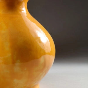 Pair of Yellow Double Gourd Vases as Lamps glazed in yellow by Andrew Allfree with a smooth reflective surface.