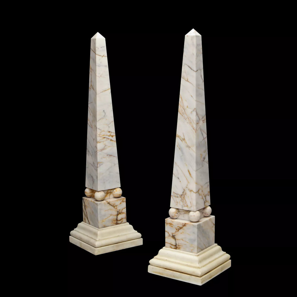 Pair of Skyros and Pentelican marble obelisks on stepped bases by Nwtiques with elegant veining