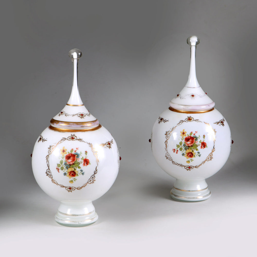 Pair of opaline glass vases with floral designs and covers from Collection TH10, showcasing elegant nineteenth-century French artistry.