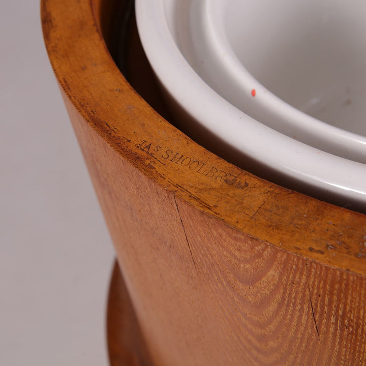 Close-up of late 19th century Shoolbred chamber pot with wooden exterior from Collection TH10 showcasing Victorian craftsmanship