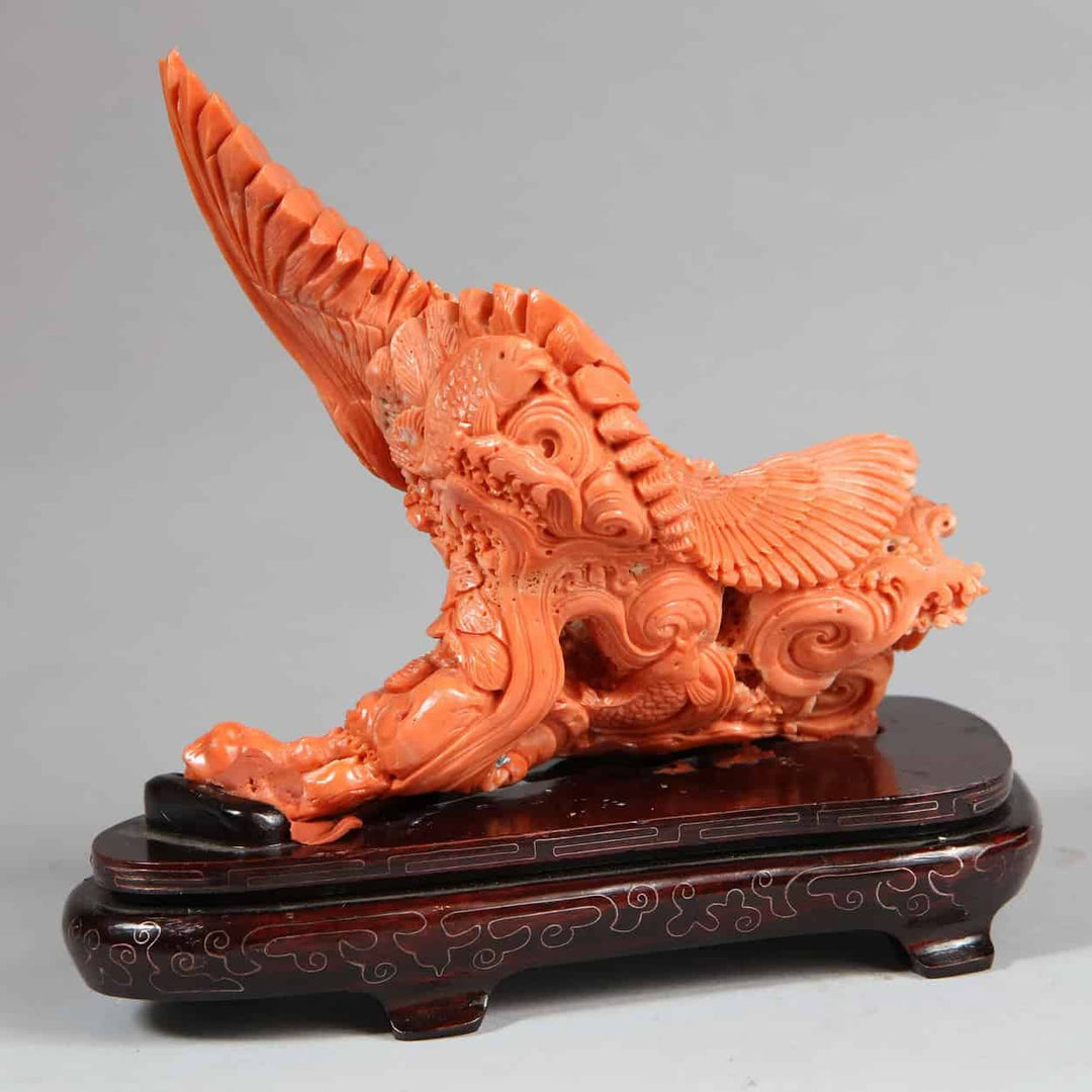 Japanese carved coral sculpture of a Stellar’s Sea Eagle catching a fish by Nwtiques