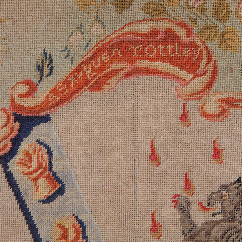 Close-up of detailed hand-embroidered armorial needlework from Pitchford Hall dining chair seat by Collection NE10