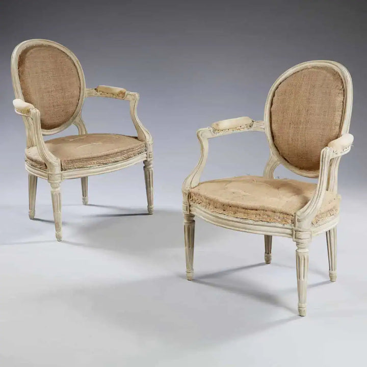 Pair of transitional Louis XV style fauteuils with burlap upholstery by Nwtiques circa 1870