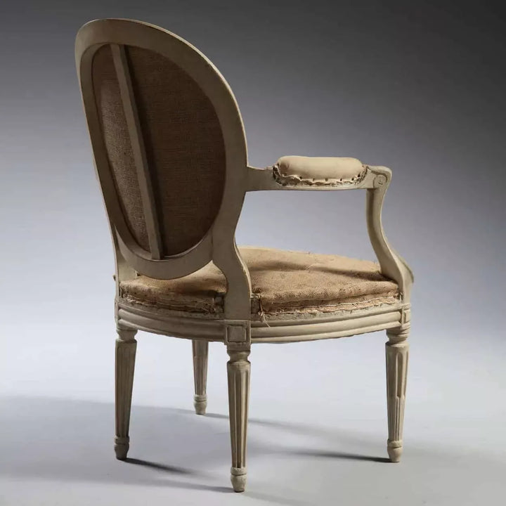 Pair of transitional Louis XV style fauteuils with oval backs and fluted legs by Nwtiques