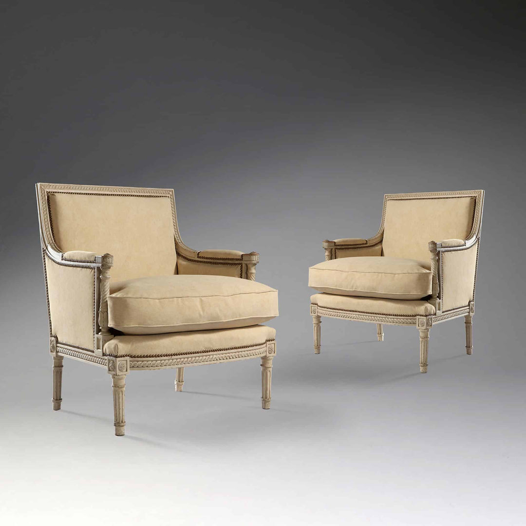 Pair of large-scale Louis XVI style marquises with beige upholstery by The Sold Archive in elegant setting
