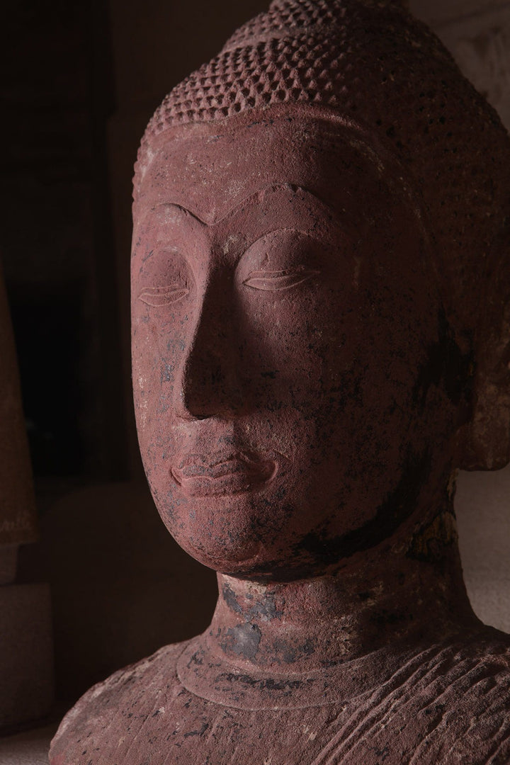 Ayutthayan Siamese red sandstone Buddha head with serene expression from Collection NE10, circa 14th century Thailand.