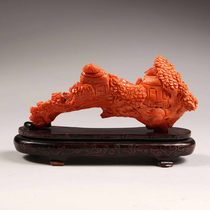 Chinese 20th century precious coral carving of figures relaxing, displayed on wood base by Nwtiques