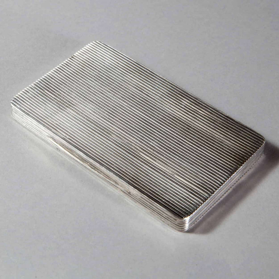 Mid 20th century Dunhill ribbed silver plate cigarette case by The Sold Archive, elegant fluted design on display