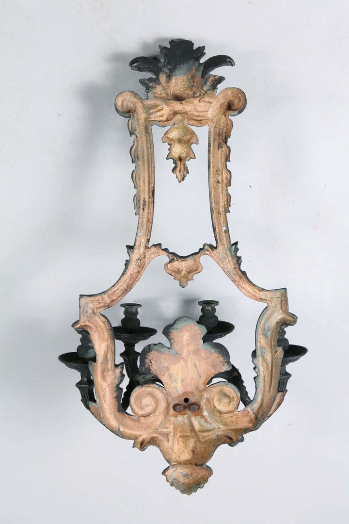Set of four Louis XIV style bronze four light wall appliques by Collection TH10 with ornate classical design