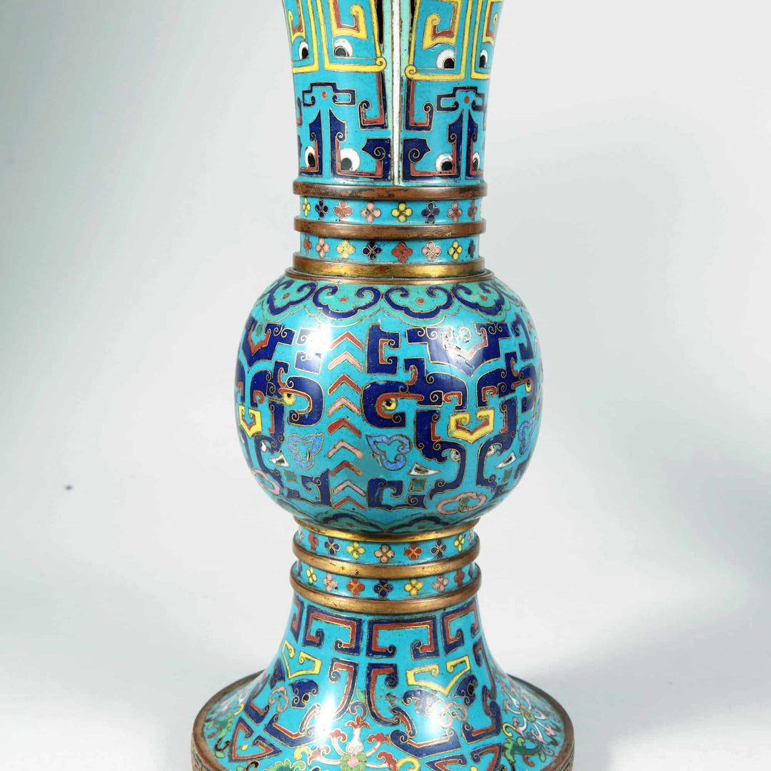 Close-up of a blue 19th century Qing Dynasty cloisonne gu vase from Nwtiques